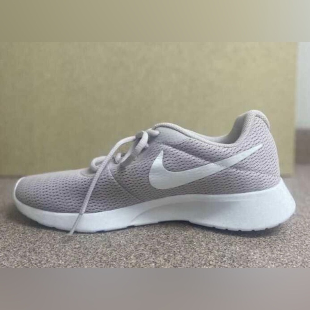 Brand new Nikes, rose gold/pink colour
